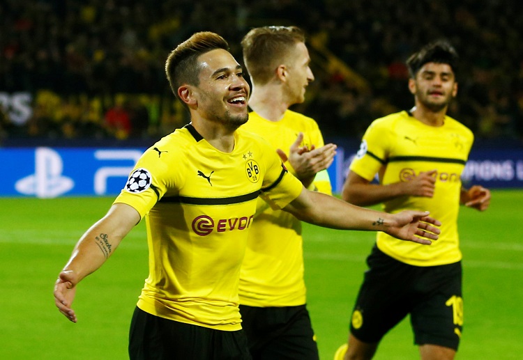 Raphael Guerreiro mencetak dua gol saat Dortmund menghancurkan Atletico 4-0.