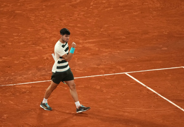 Carlos Alcaraz booked his place in the French Open final after Lorenzo Musetti retired with a left-leg injury