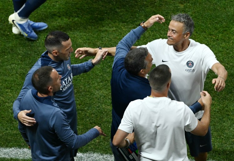 Following the 2025 Club World Cup win against Bayern Munich, Luis Enrique joins his staff in a joyful celebration